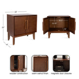 Rectangular wooden side table in warm walnut finish with two vertical handles, tapered legs, and open storage behind double doors showing interior dimensions.
