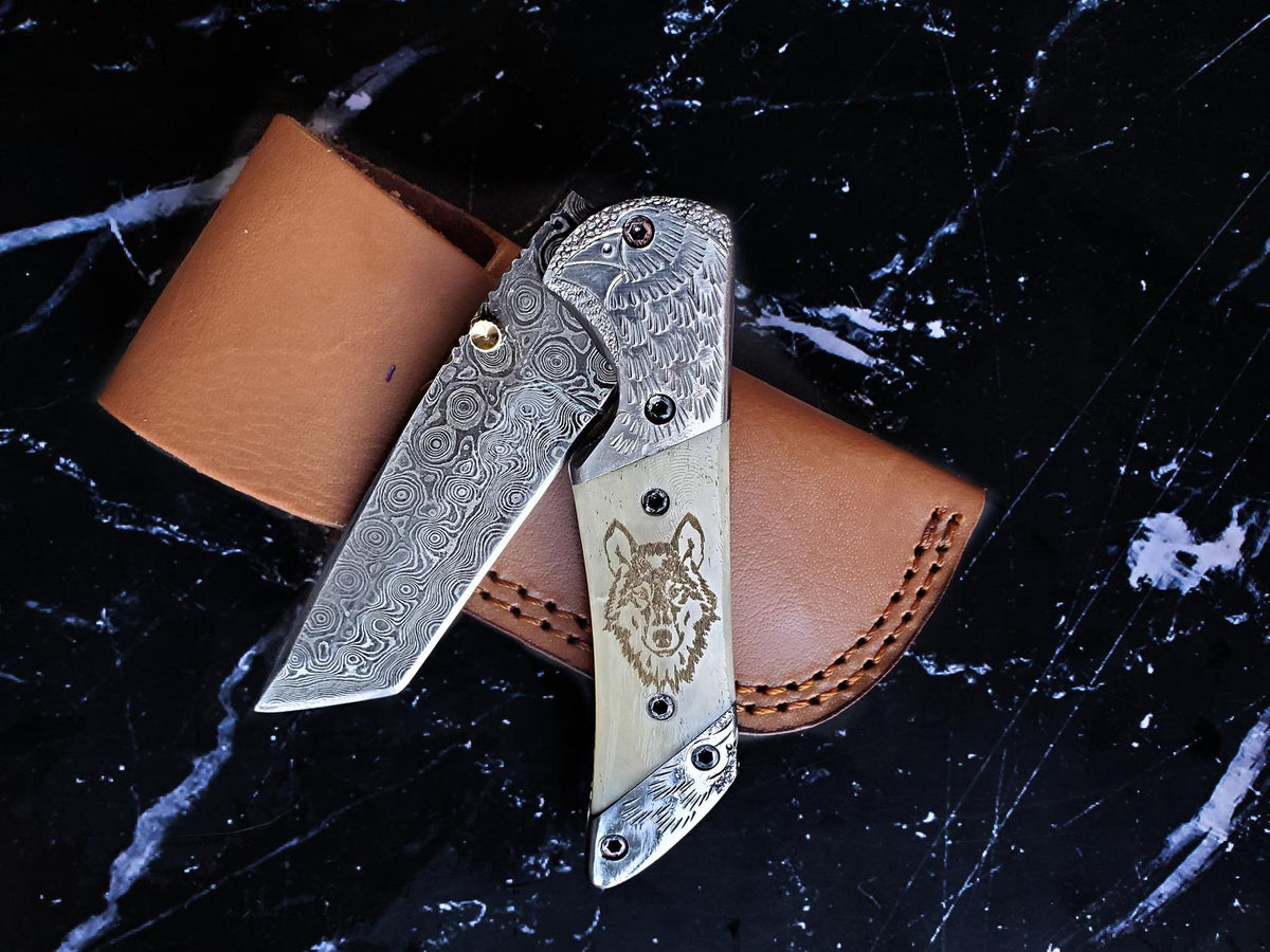 Titan American Eagle Damascus folding blade knife with bone handle and engraved steel bolster