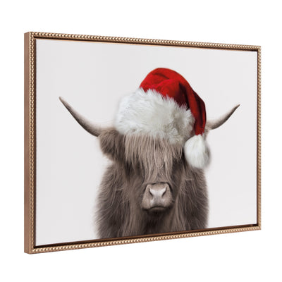 Framed canvas art showing a highland cow wearing a Santa hat on a gold vintage beaded frame