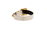 Off-white iridescent snake-patterned collar featuring a gold-tone buckle and Swarovski crystal details, shown partially coiled on a white background.
