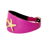 Fuchsia pink Italian leather dog collar with a 3-inch width, featuring a textured gold starfish embellishment and a gold buckle closure.