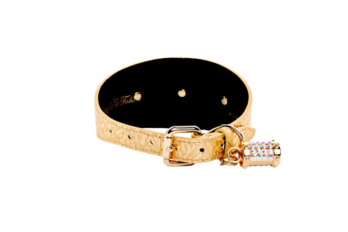 Gold leather collar with a floral print and adjustable buckle, featuring a small gold sunflower-shaped rivet and a charm decorated with multicolored rhinestones.