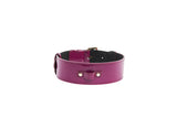 Glossy purple patent leather collar with classic silver buckle hardware and rivets, shown from the front on a white background.