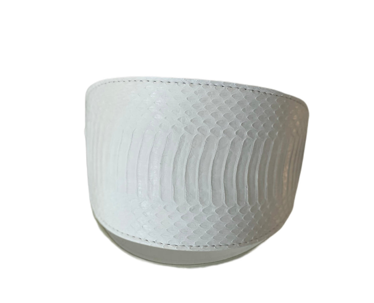 Matte white pet collar with an oval shape featuring a subtle snake scale texture and detailed stitching along the edges.