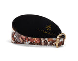 3-inch wide dog collar with brown and orange butterfly print on Italian leather and gold-tone buckle, shown curved on white background.