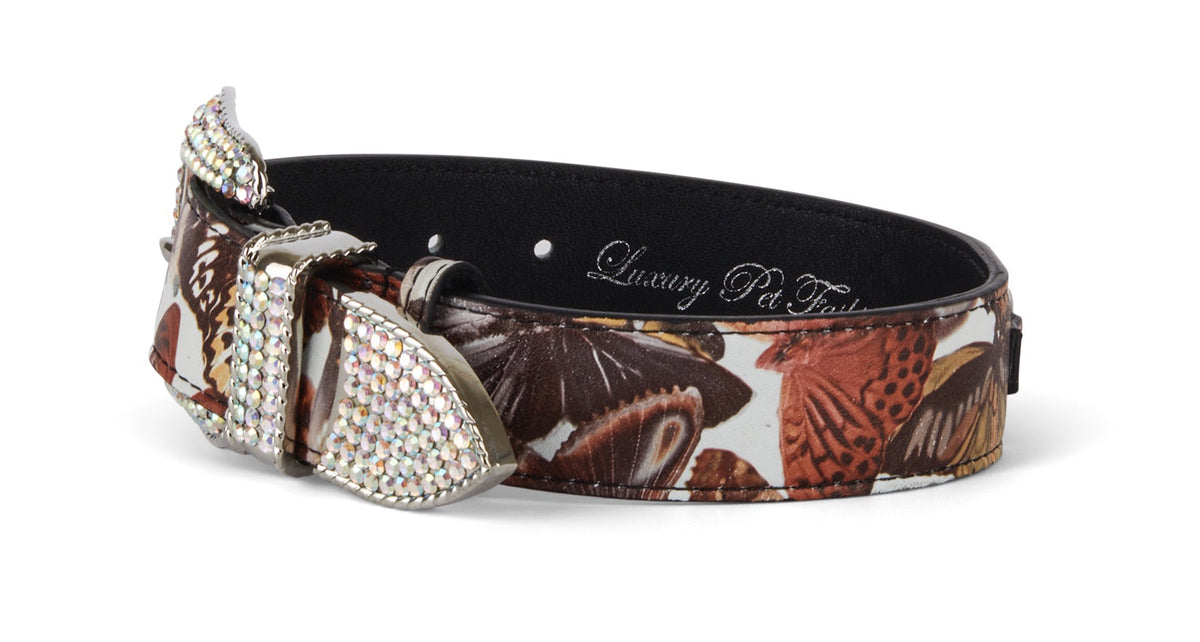 Brown leather dog collar with multicolored butterfly print and silver buckle adorned with Swarovski crystals, shown on a white background.