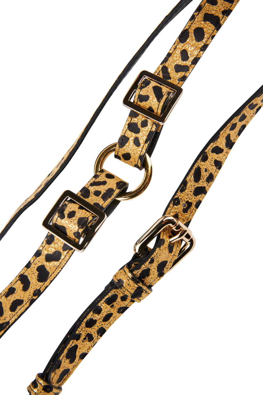 Close-up of leopard print leather straps featuring gold-tone hardware including buckles and a circular ring detail.