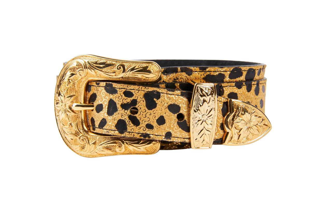 Leopard print Italian leather belt with an ornate gold floral western-style buckle and matching gold floral belt loop and tip.