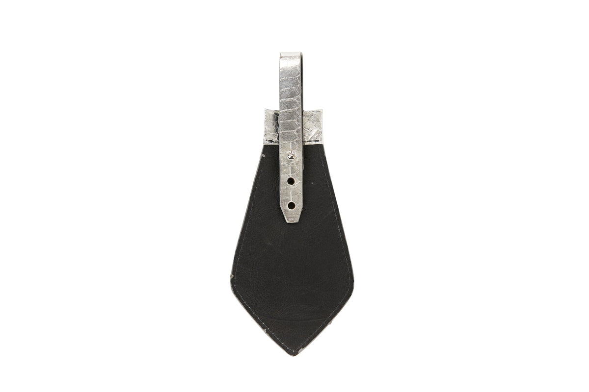 Black leather tie with a wide, pointed shape and a textured silver metal clip attached at the top center.