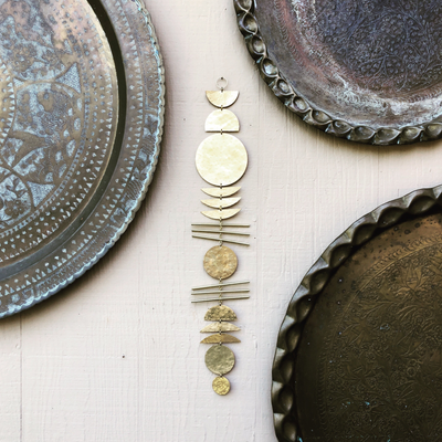 Earth Angel wall hanging with hammered brass and driftwood by Vida + Luz