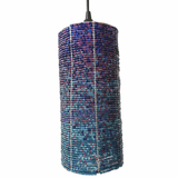 Tall cylindrical pendant light with textured, woven appearance in shades of blue and purple, suspended from a black cord, vertical rib details visible