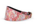 Wide pink collar with iridescent gold and silver flakes in an abstract Art Deco pattern, featuring a gold-tone metal buckle, shown in side view.