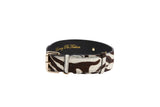 Brown and white distressed zebra print dog collar with gold-toned buckle and loop, featuring 'Savvy Pet Fashion' embossed in gold on the black inner band.