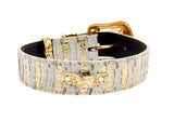 White washed leather dog collar with gold snake pattern and gold buckle hardware accented by Swarovski crystal studs, shown coiled against a white background.