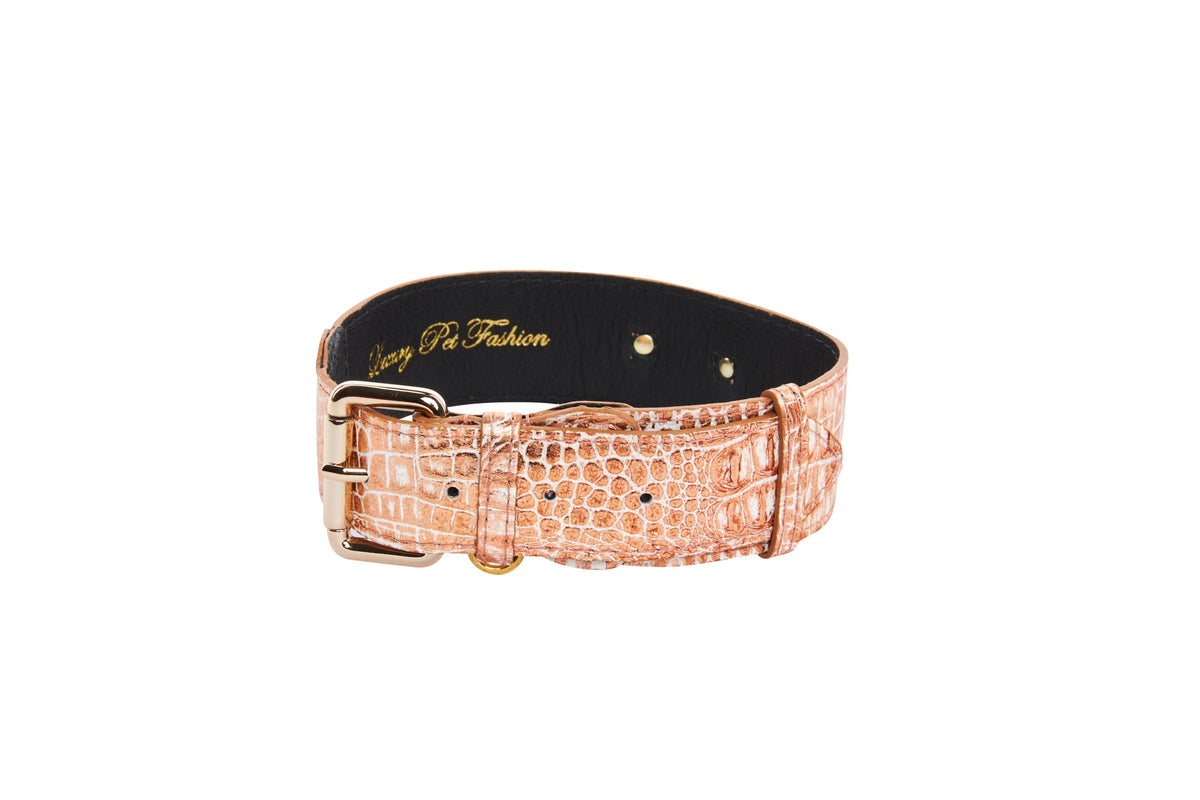 Copper-colored embossed croc leather dog collar with a classic buckle and stitched detailing, featuring a smooth black interior lining.