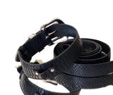 Coiled black leather pet collar and leash set with embossed python skin texture and silver metal buckle and hardware.