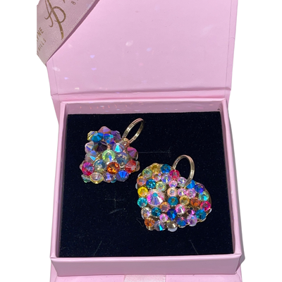 Two multi color Swarovski crystal heart charms, one puffy and one flat
