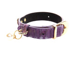 XS purple snakeskin-textured collar with gold-tone buckle and a small dangling pearl charm on a ring