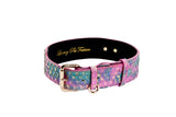 Pet collar with iridescent pink and blue tilapia scale pattern and gold buckle and hardware, labeled Luxury Pet Fashion inside.