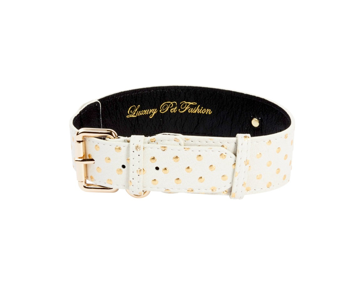 White Italian leather pet collar with gold polka dots, gold buckle, and black interior stamped with 'Luxury Pet Fashion' in gold lettering.