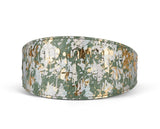 Curved 3-inch wide style collar with iridescent green, gold, and silver abstract pattern inspired by Art Deco design, shown on a white background.