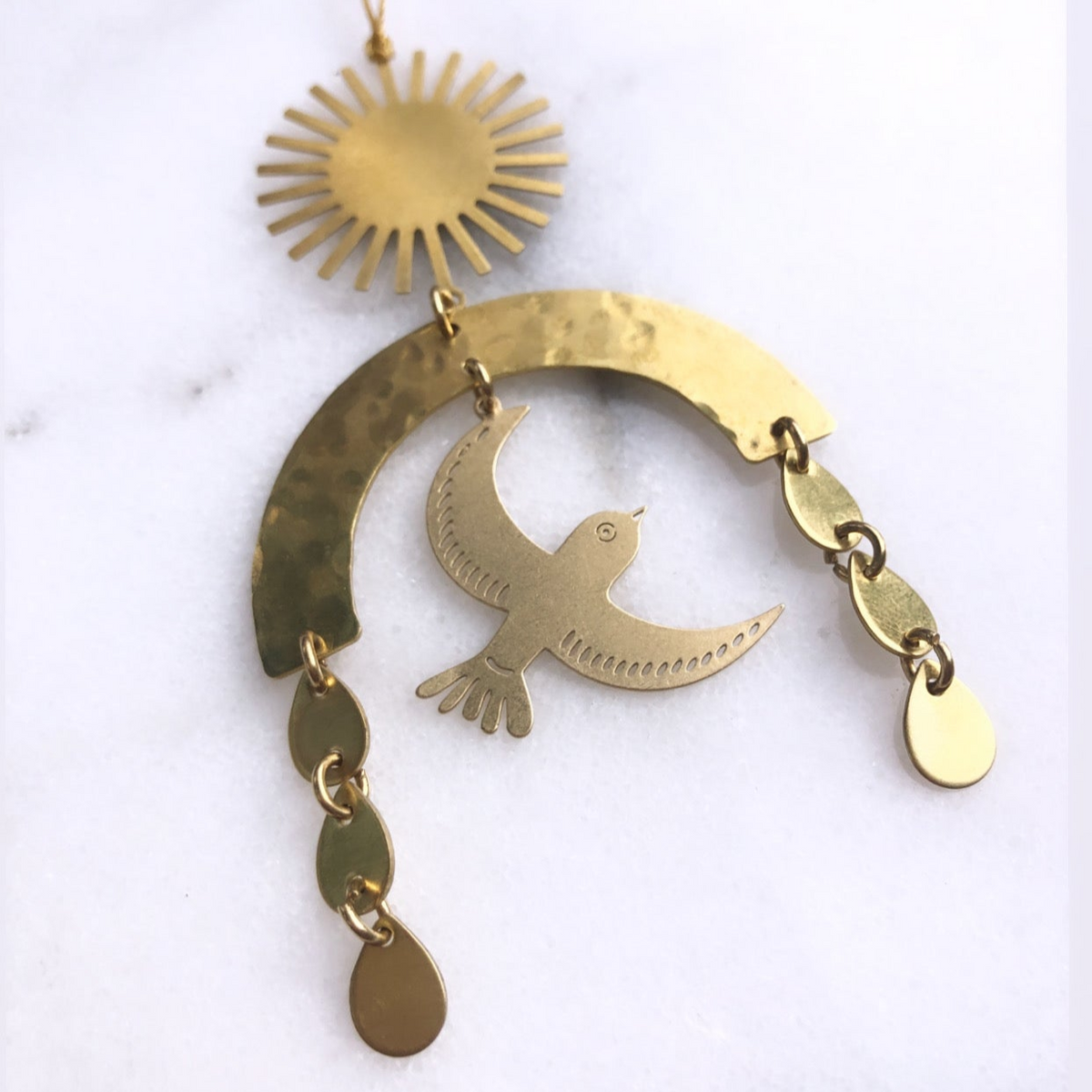 First Light Ornament by Vida + Luz, handcrafted hammered brass sheet with hanging cord