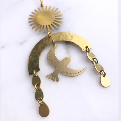 First Light Ornament by Vida + Luz, handcrafted hammered brass sheet with hanging cord