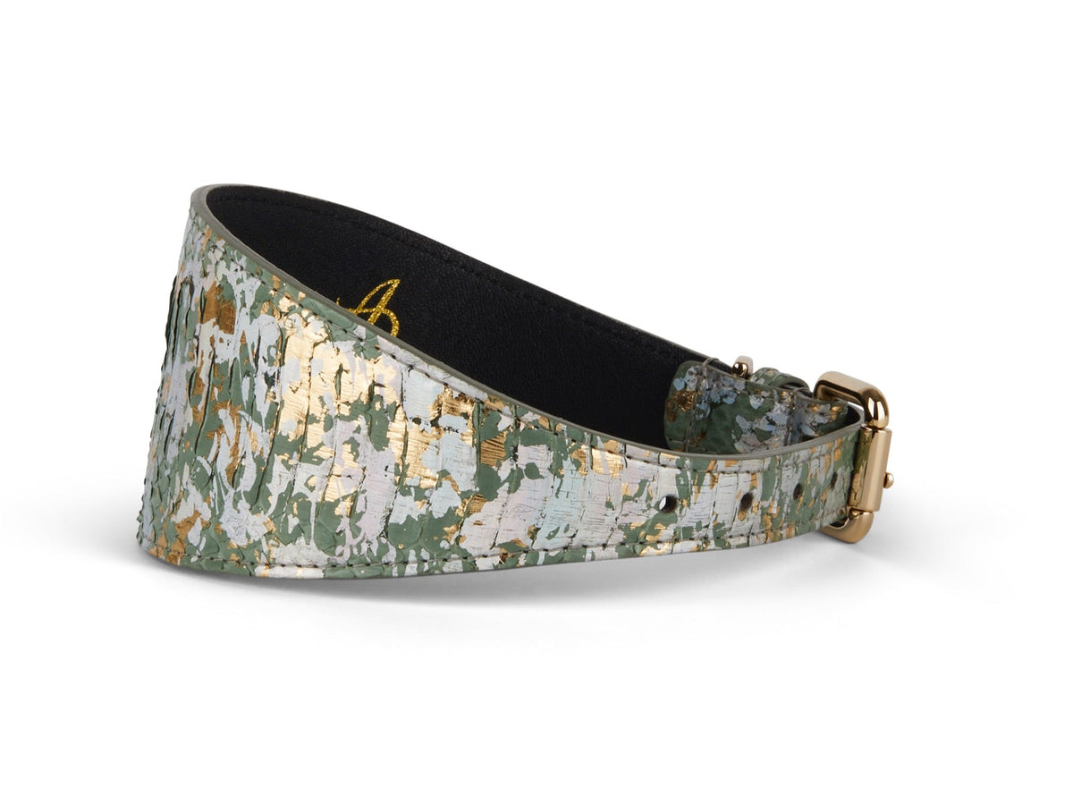 Iridescent wide collar with green, gold, and silver metallic flakes in an Art Deco pattern, featuring a gold-tone buckle and a black inner lining.