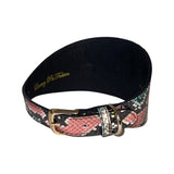Wide dog collar with embossed multicolor snake pattern in pink, black, and white, featuring a gold buckle and matching loop on black leather interior.