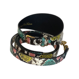 Rolled multi-color embossed snake-patterned leather collar and leash set with gold-tone hardware accents, highlighting teal, pink, yellow, and black hues.