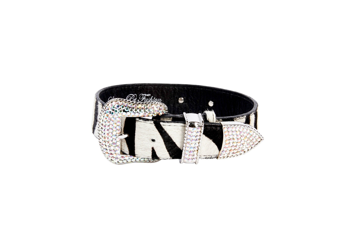 Black and white zebra-print hair-on-hide leather belt featuring a buckle and loop encrusted with sparkling Swarovski crystals.
