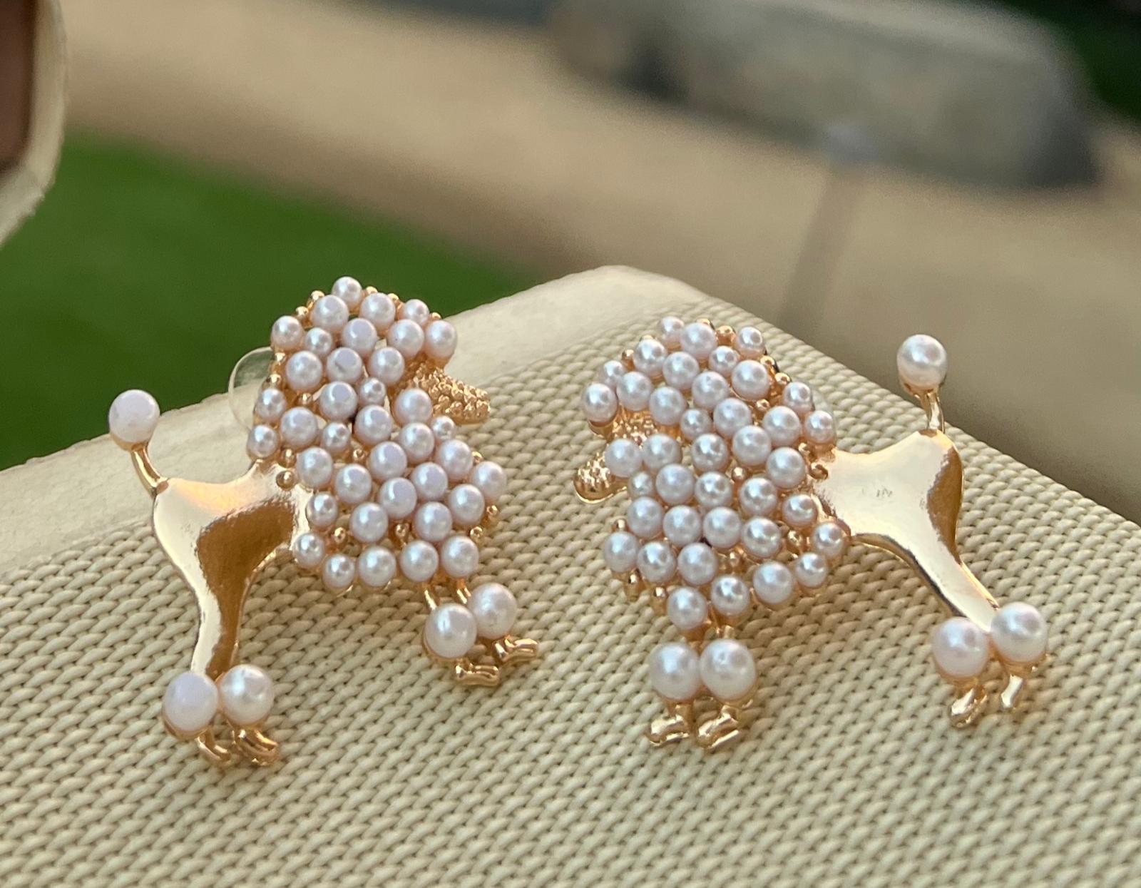 Close-up view of Pearl Poodle Earrings featuring a poodle silhouette adorned with pearl details.
