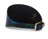 Wide 4-inch dog collar with a glossy snake-scale pattern in blue, green, black, and yellow hues, featuring a gold-tone buckle and black inner lining.