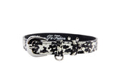 Black and white snake-patterned collar with silver oval buckle and metal D-ring, shown flat against a white background.