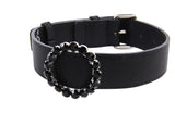 Black Italian leather collar featuring a circular ring adorned with black crystals and a silver metal buckle, shown partially coiled on a white background.