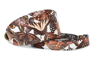 Butterfly print Italian leather wide style collar and matching leash set arranged together