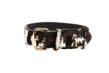 Brown, black, and white hair-on-hide dog collar with rectangular gold buckle and D-ring, shown against a white background.