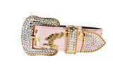 Soft pink snake-patterned collar with metallic gold accents and a large gold buckle encrusted with iridescent Swarovski crystals, shown against white background.