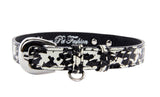 Black and white snake-patterned dog collar with a silver oval buckle and a small D-ring for attaching tags or leash.