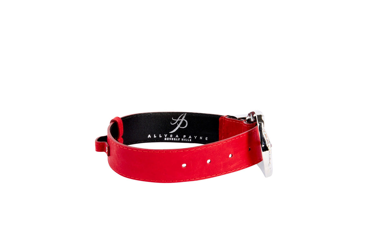 Red distressed Italian leather collar with silver ornate buckle featuring Swarovski stones, shown against a white background.