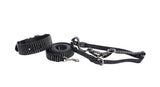 Black leather dog collar, leash, and harness set with silver vertical stripes and metal hardware, arranged on a white background.