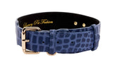 Blue embossed crocodile-patterned leather collar with shiny gold buckle and classic hardware, featuring the gold-embossed text 'Luxury Pà Fashion' inside.