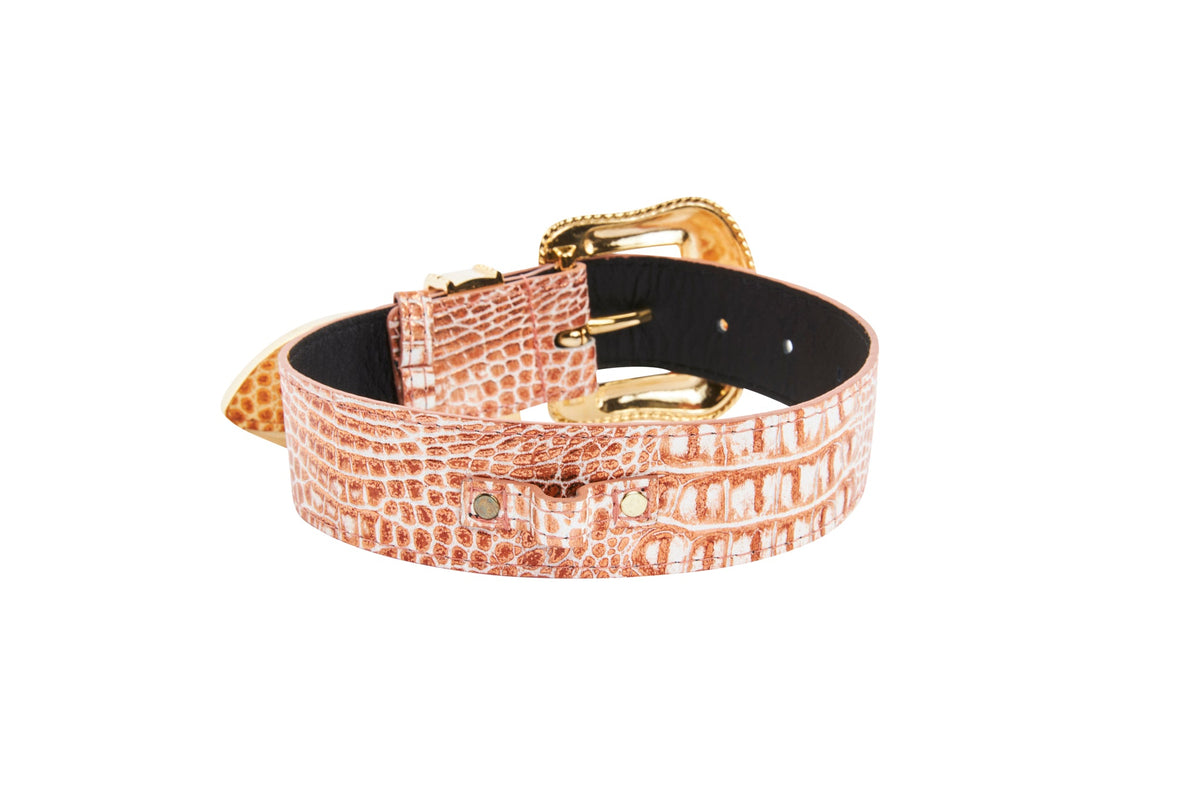 Copper embossed crocodile-patterned leather collar with a gold-tone buckle and black interior lining, shown coiled on a white background.