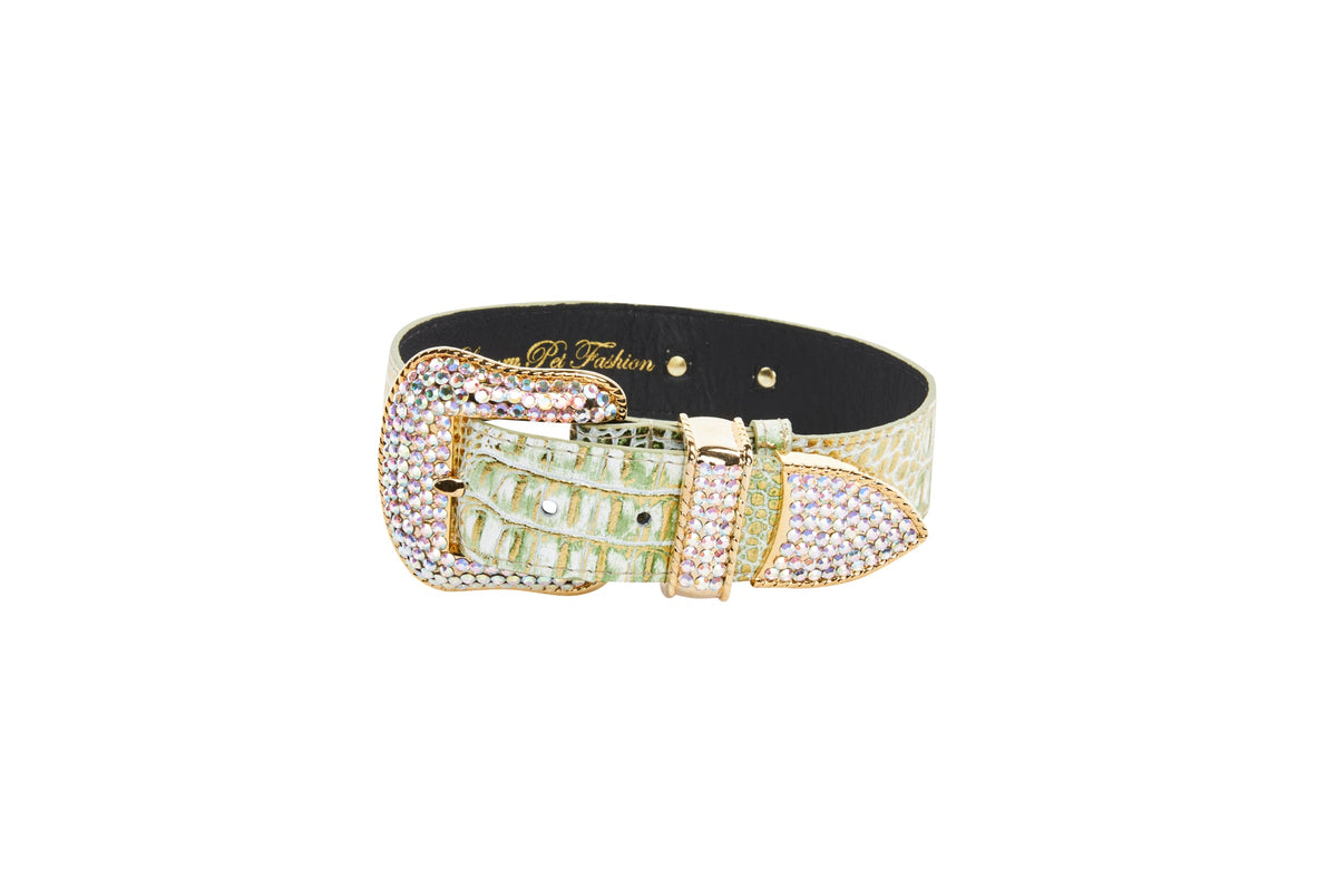 Green and gold crocodile-embossed Italian leather collar with a large gold buckle encrusted with small Swarovski crystals on a white background.