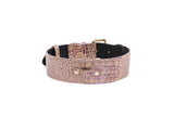 Pink and purple embossed crocodile-patterned leather band with silver accents and gold-tone hardware, presented on a white background.