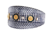 White and navy snake pattern cuff bracelet adorned with alternating gold nautical medallions and white pearl accents.