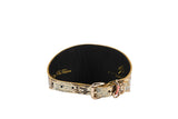 Wide dog collar with multi-color gold snake pattern on the outside and solid black interior, featuring a gold buckle and D-ring.