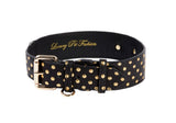 Black Italian leather dog collar with evenly spaced gold polka dots, gold buckle, D-ring, and inner gold script lettering.
