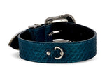Matte blue collar with iridescent snake-patterned texture and shiny silver buckle hardware, shown coiled on a white background.