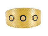 Wide collar in pearl yellow snake texture adorned with three circular vintage gold rivets encircled by navy blue accents, displayed flat on white background.